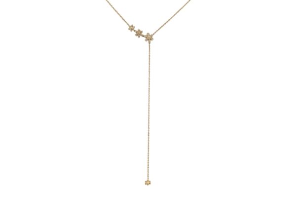 Elegant floral lariat necklace with delicate flowers cascading down to a single bloom, featuring a sparkling diamond at its center — timeless and sophisticated design.