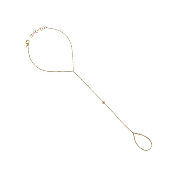 Delicate hand chain with a central tri-diamond cluster resting at the wrist.