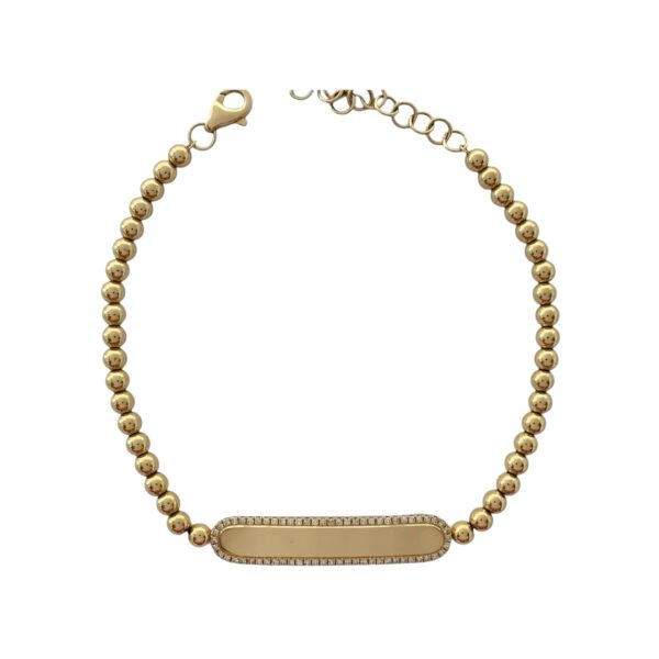Bracelet with a sleek diamond-accented bar plate centered on a delicate beaded chain, blending modern and classic design.