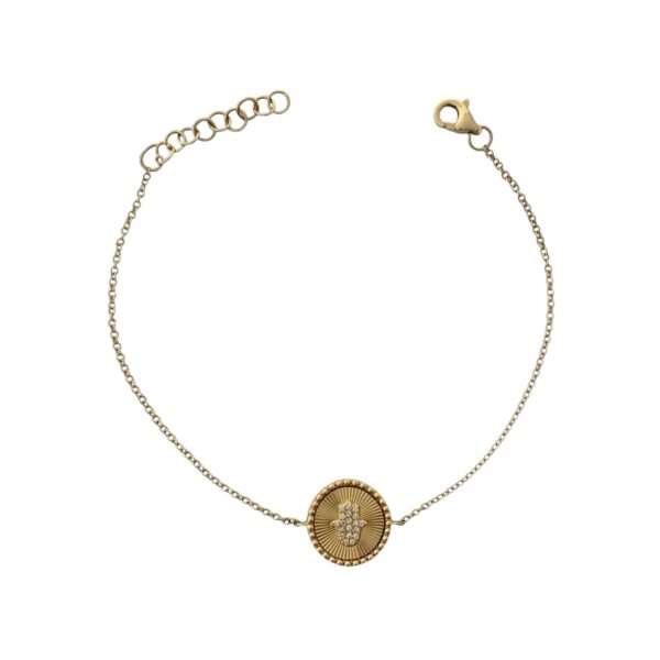 Bracelet featuring a circular medallion with a diamond-accented Hamsa charm at the center, set on a delicate gold chain for a refined, symbolic look.