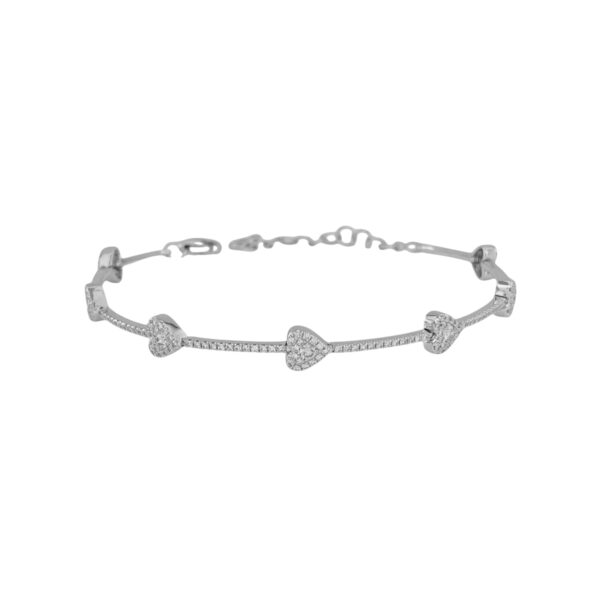 White gold bangle bracelet featuring diamond-pave hearts, with continuous sparkle and elegant design, perfect for layering or as a statement piece.