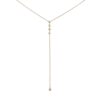 Lariat necklace featuring diamond bezels cascading down to a single diamond bezel drop, crafted in yellow gold — a refined and versatile piece for any occasion.