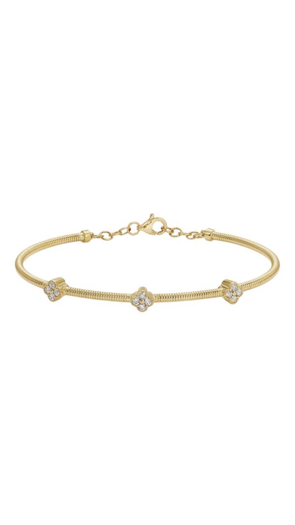Gold omega chain bracelet with three small flower-shaped stone clusters evenly spaced along the band, shown against a white background.