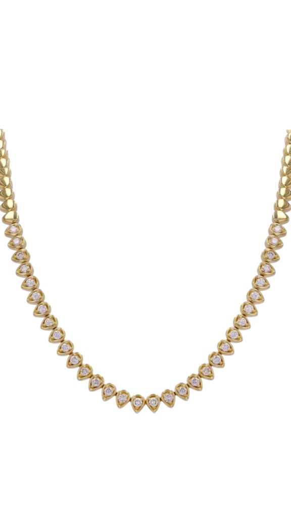 Gold necklace with teardrop-shaped bezels, each set with a round-cut diamond-like stone, displayed on a white background.