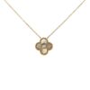 Gold necklace with a four-leaf clover-shaped pendant featuring a sunburst texture and center stone, photographed on a white background.